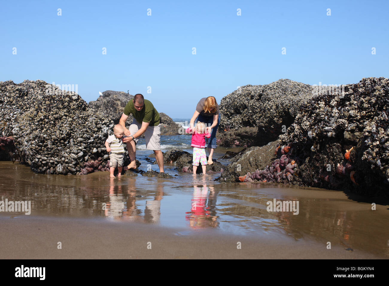 Family at beach Stock Photo