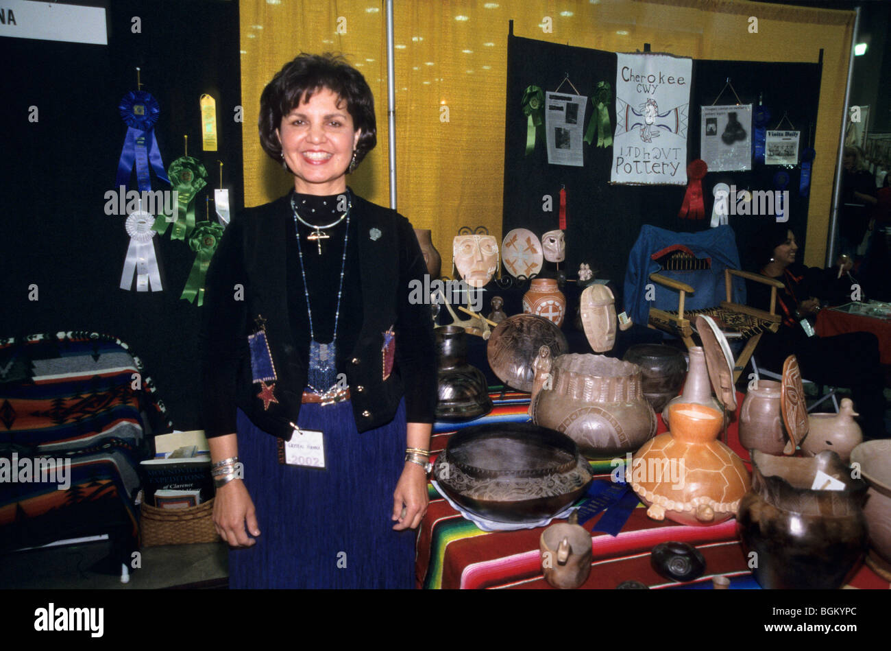 Cherokee Clay artist, Crystal Hanna, displays her pottery designs at the Red Earth Indian