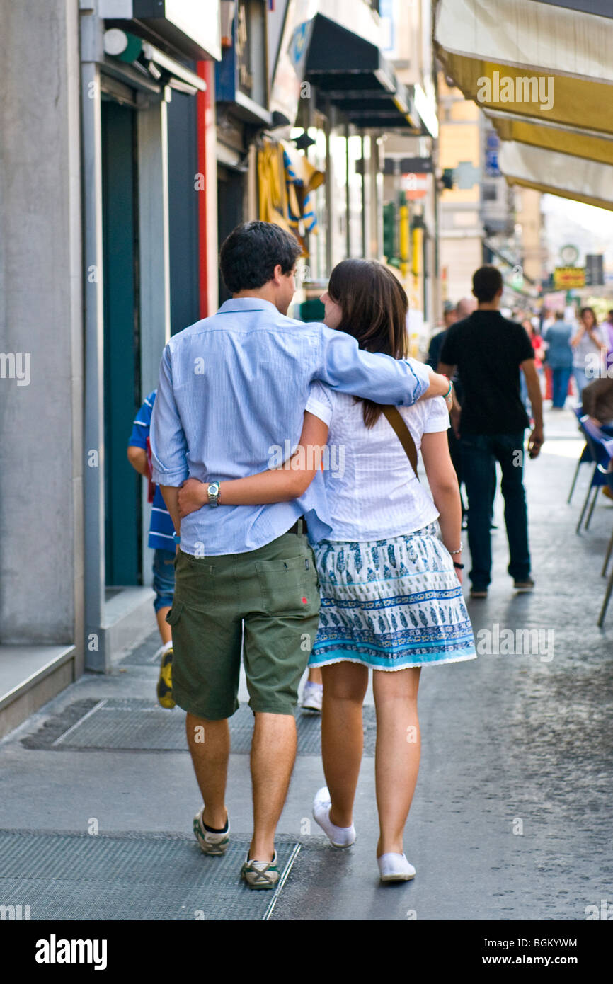 Pair of young lovers, Buenos Aires street, Milan, Italy Stock Photo