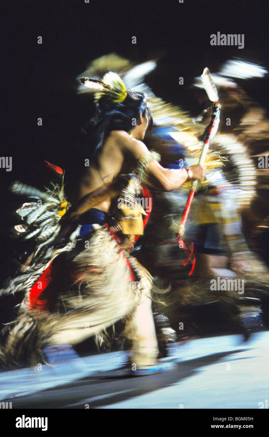 Traditional dancer dressed in regalia during the Red Earth Indian