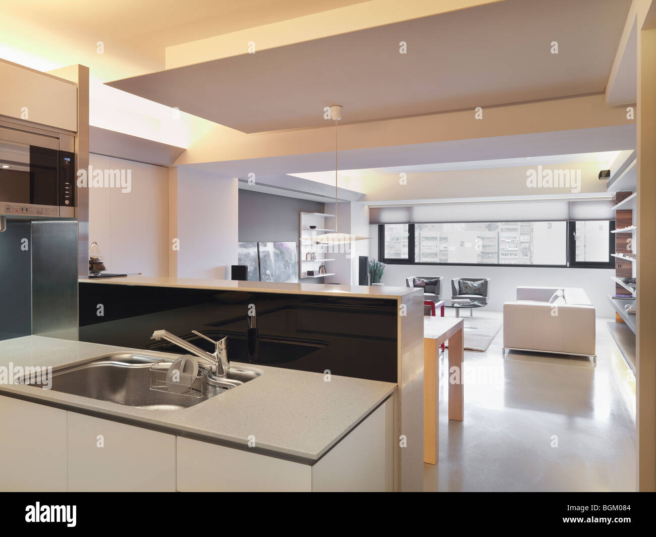 Kitchen sink and living room Stock Photo Alamy