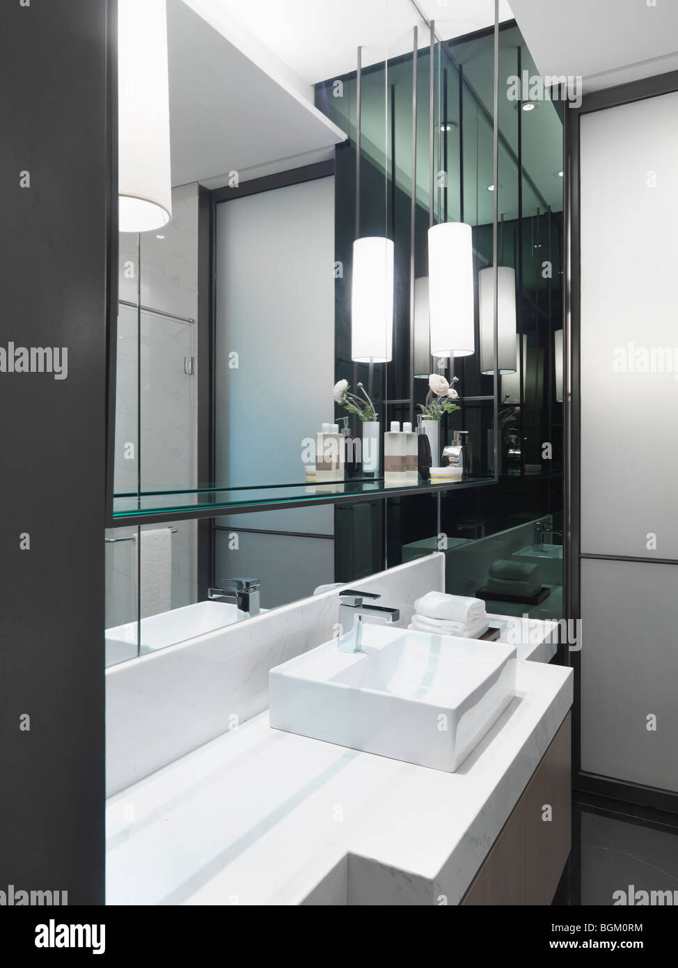 White bathroom sink on white countertop Stock Photo Alamy