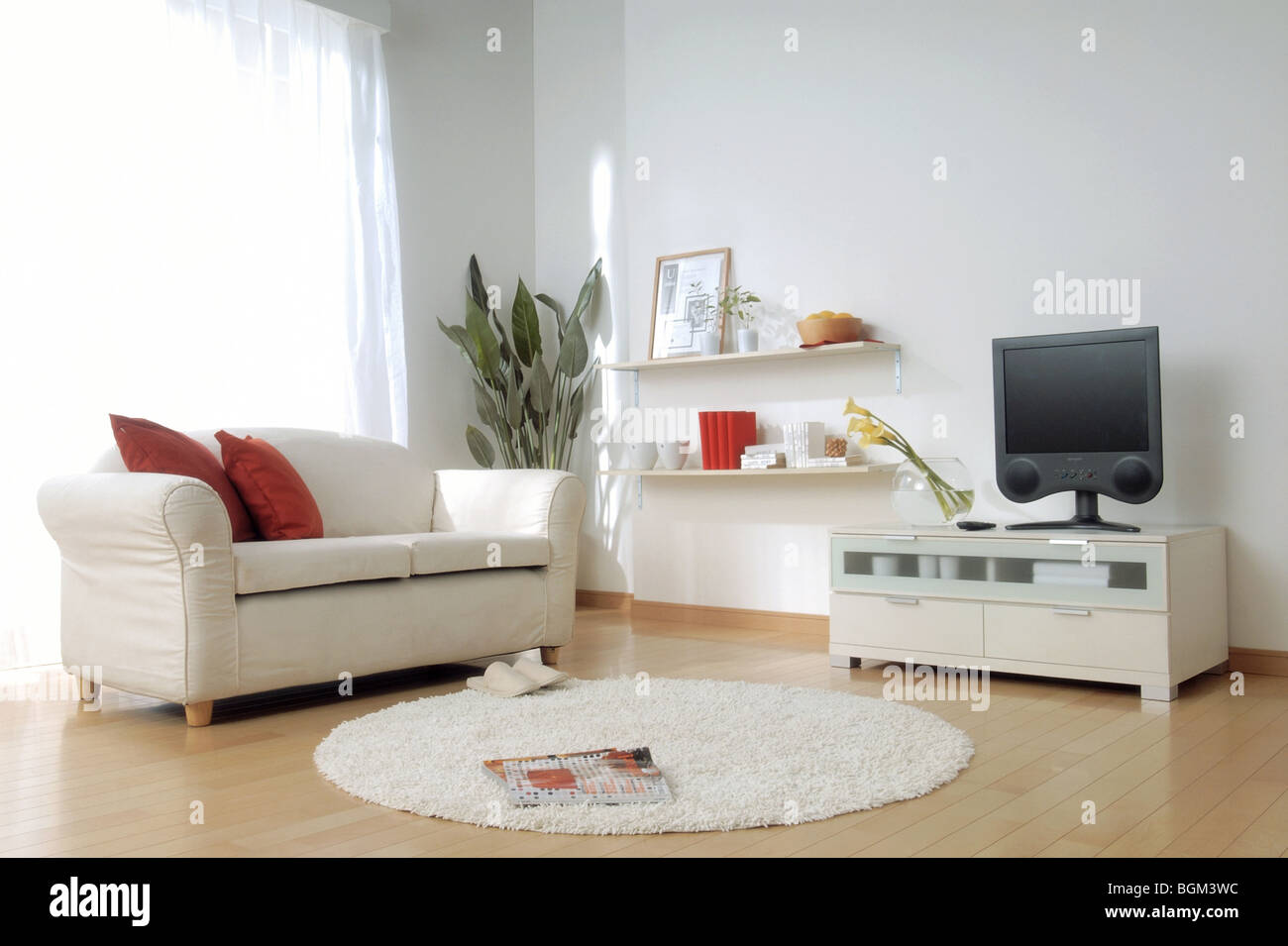 Living room with sofa and television Stock Photo - Alamy