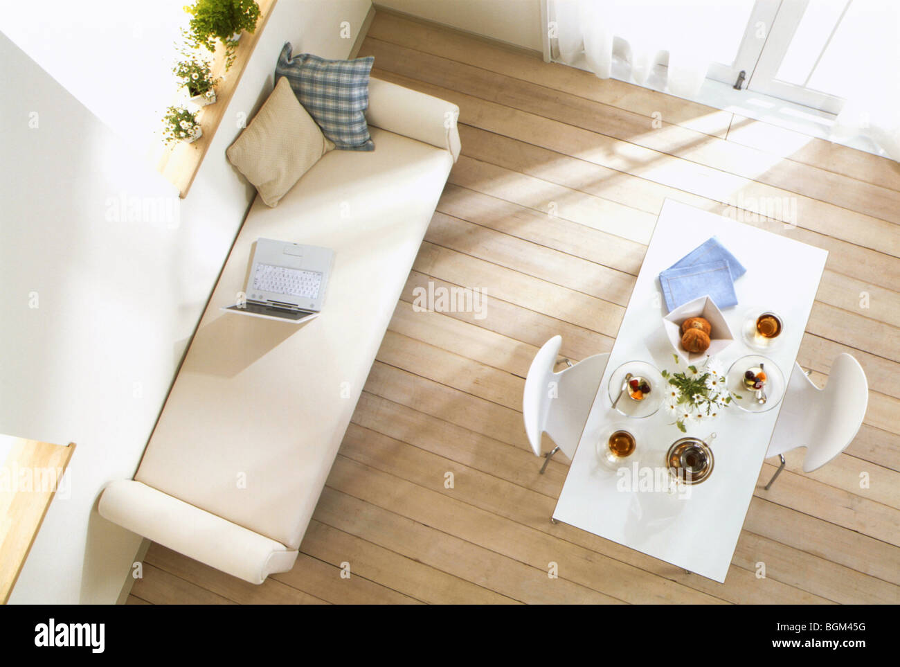 Meal on table next to sofa Stock Photo Alamy