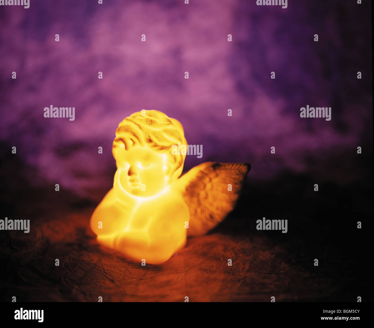 Illuminated angel lamp Stock Photo - Alamy