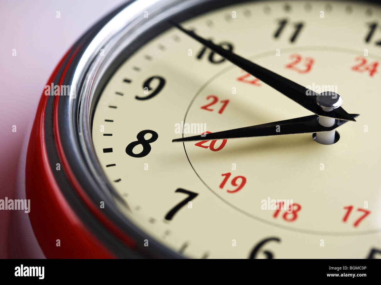 analogue clock detail, hands showing ten minutes to eight o'clock
