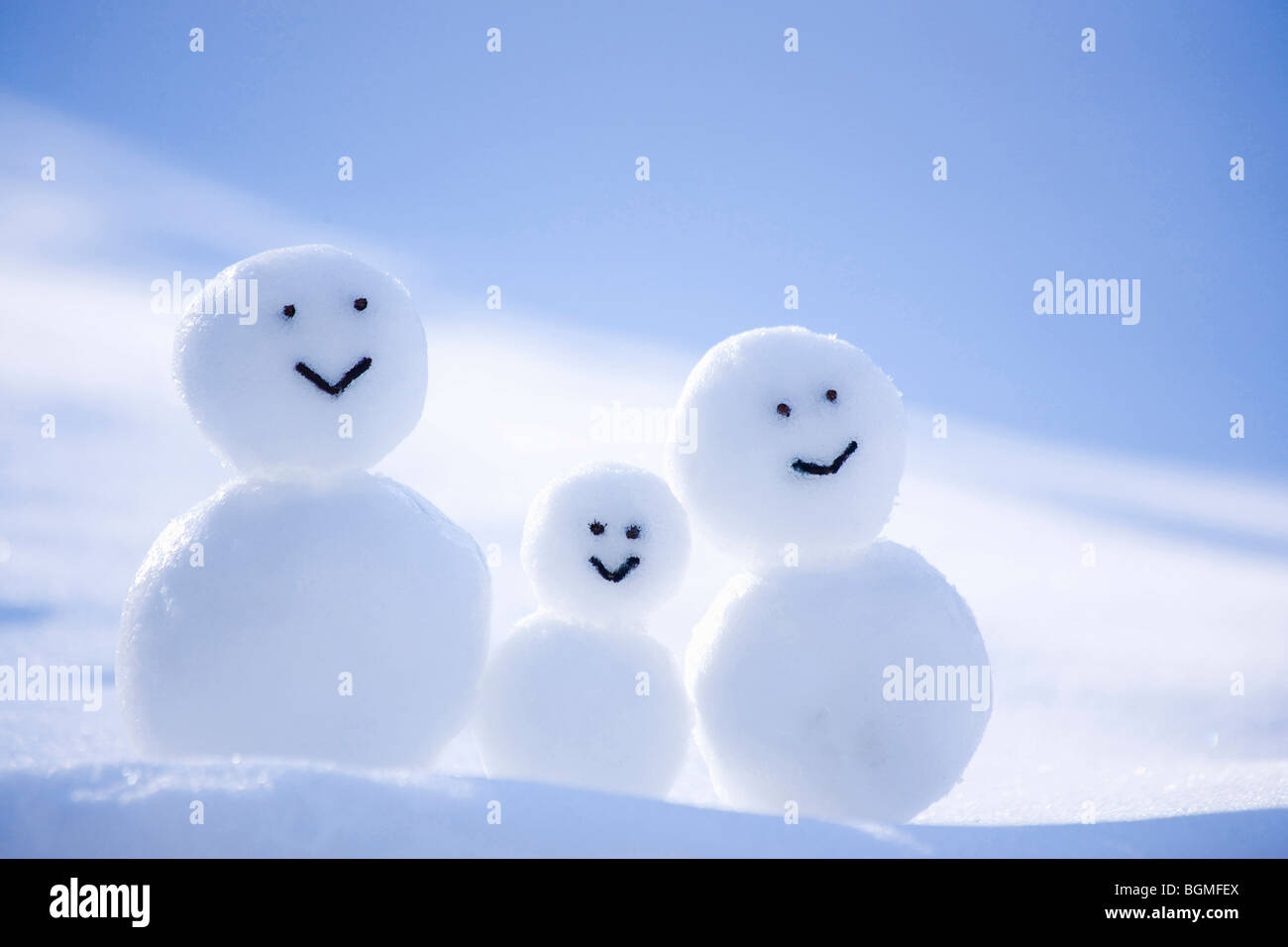 A Snowman Family Stock Photo - Alamy