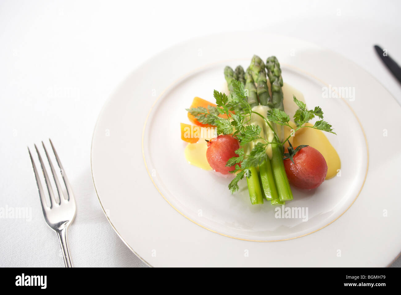 Variety of vegetables with hollandaise sauce Stock Photo