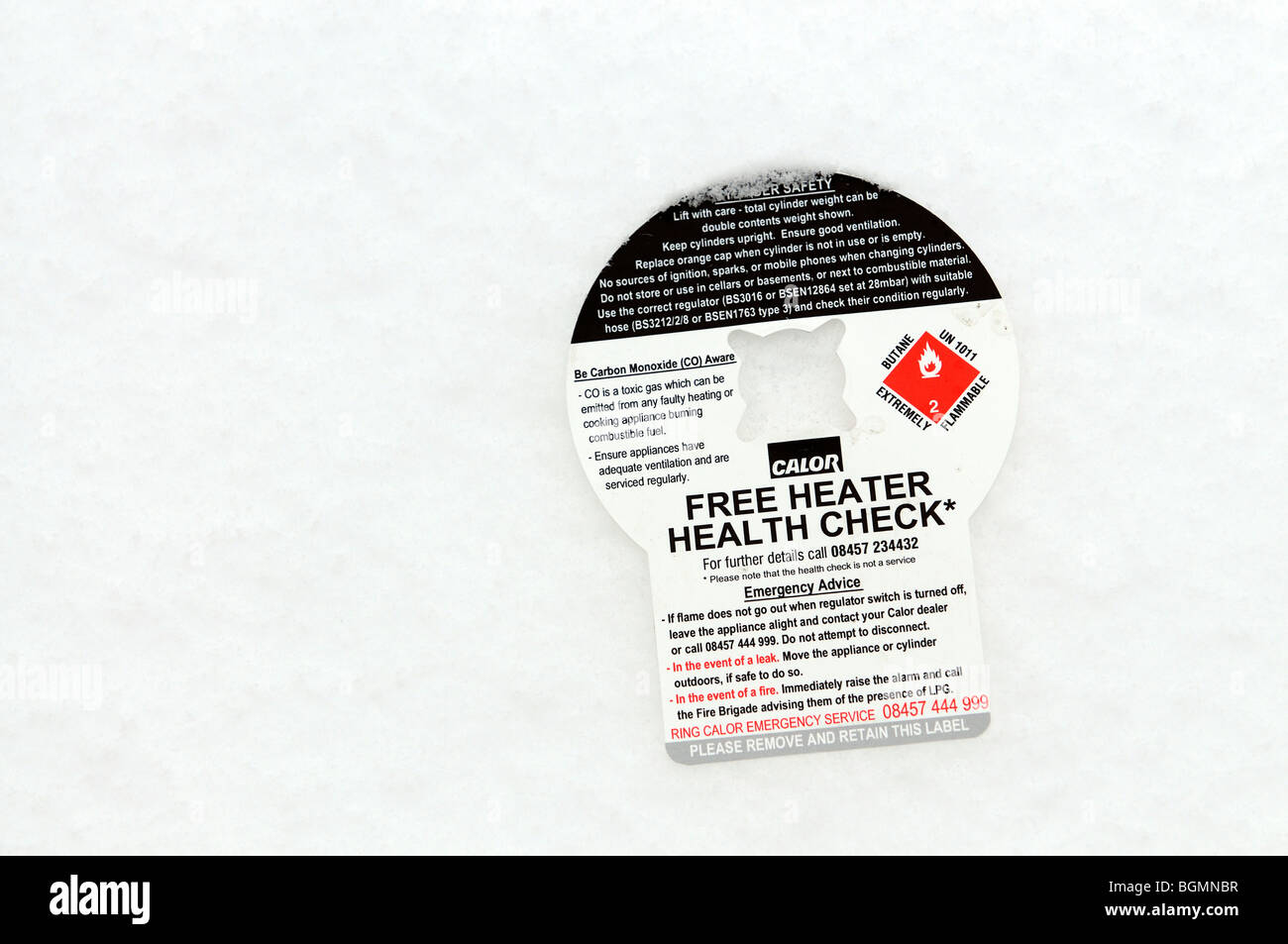 Butane cylinder bottle's free heater health check notice Stock Photo