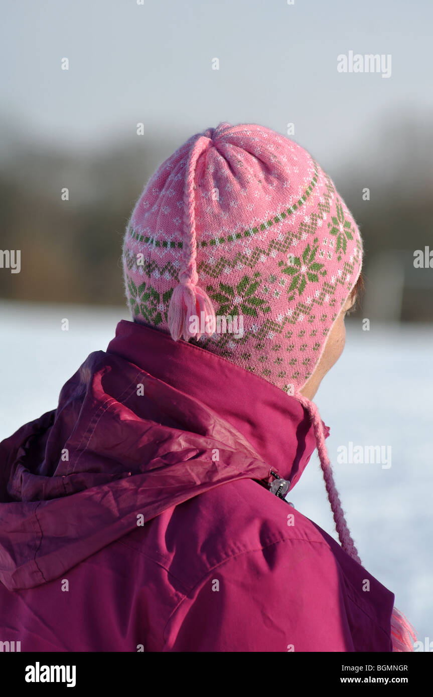 Woman wearing woolly hat in winter, UK Stock Photo