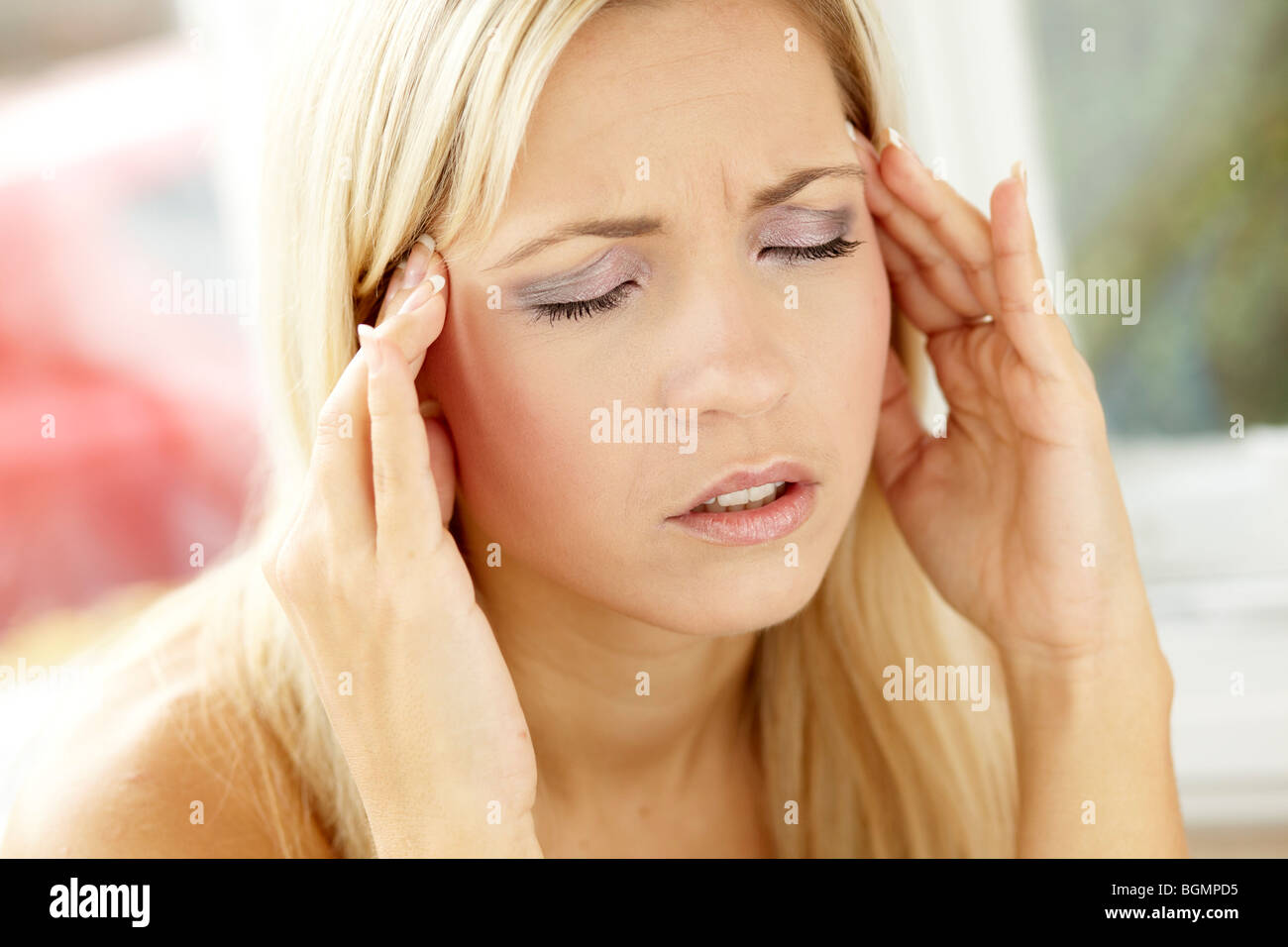 Woman with headache Stock Photo Alamy