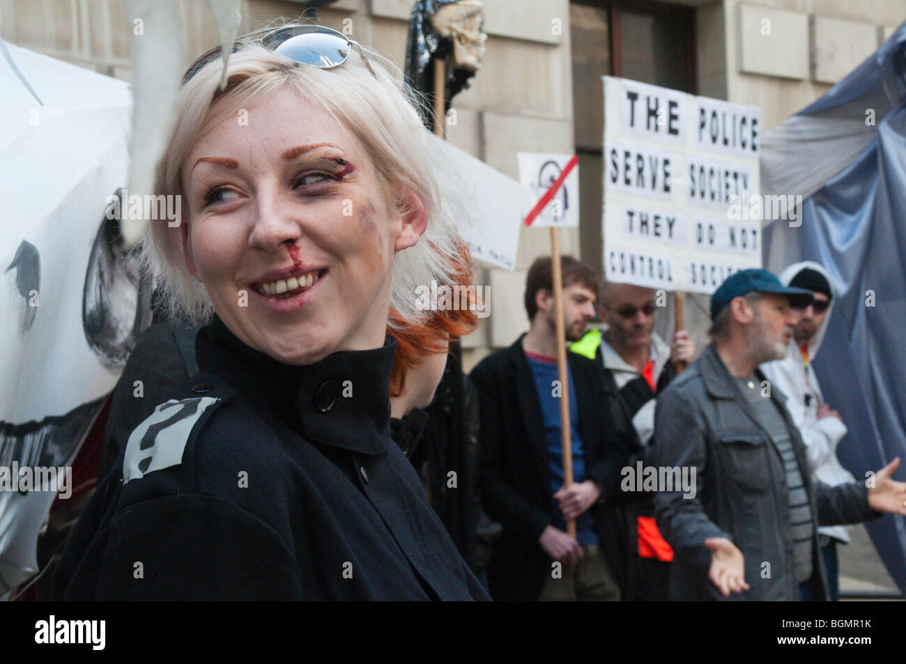 Protest at HQ of City of London Police woman with facial injuries