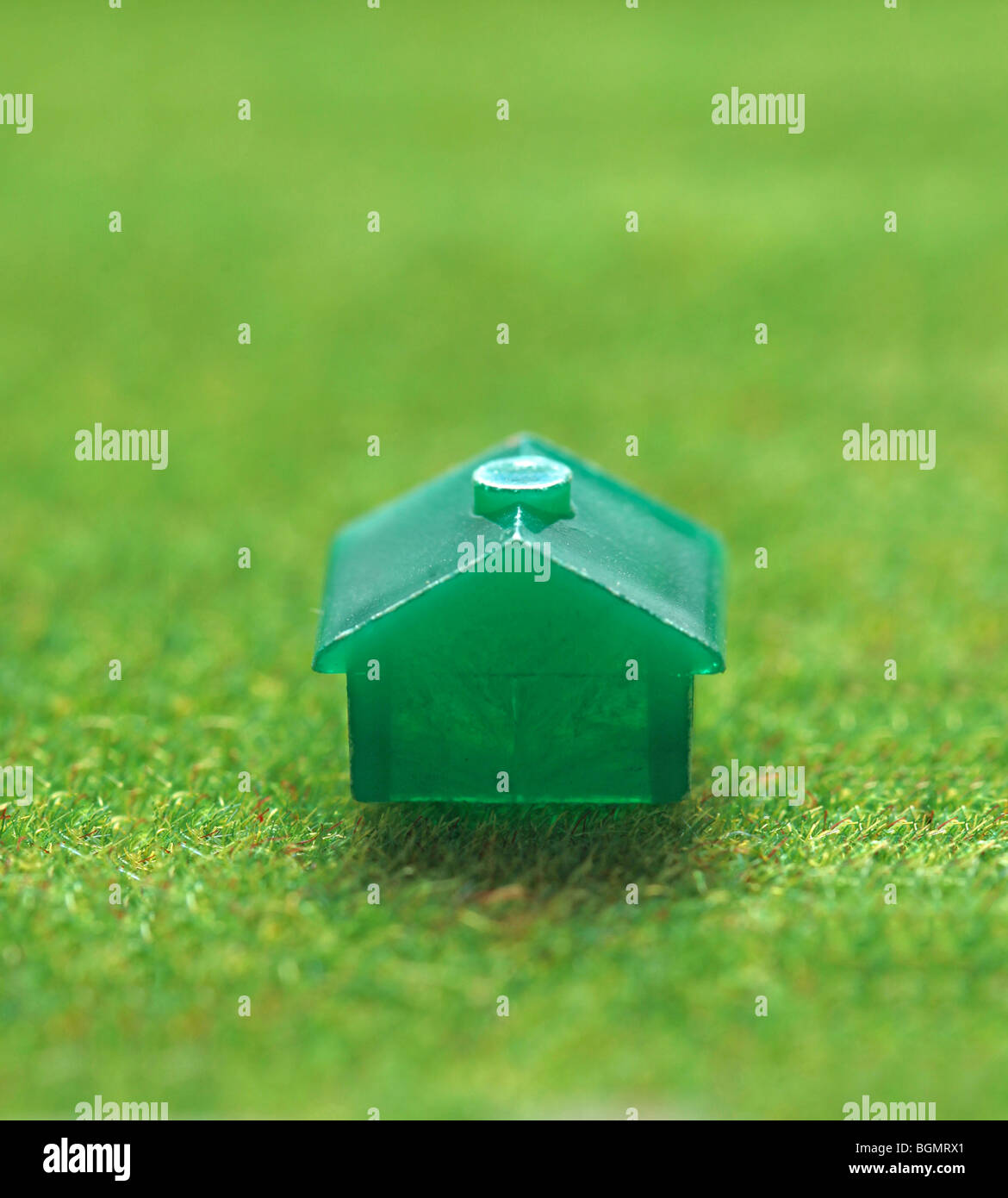 small green house on grass Stock Photo