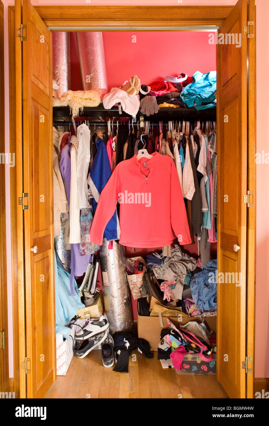 A clothes closet in a teenage girl s bedroom Stock Photo Alamy