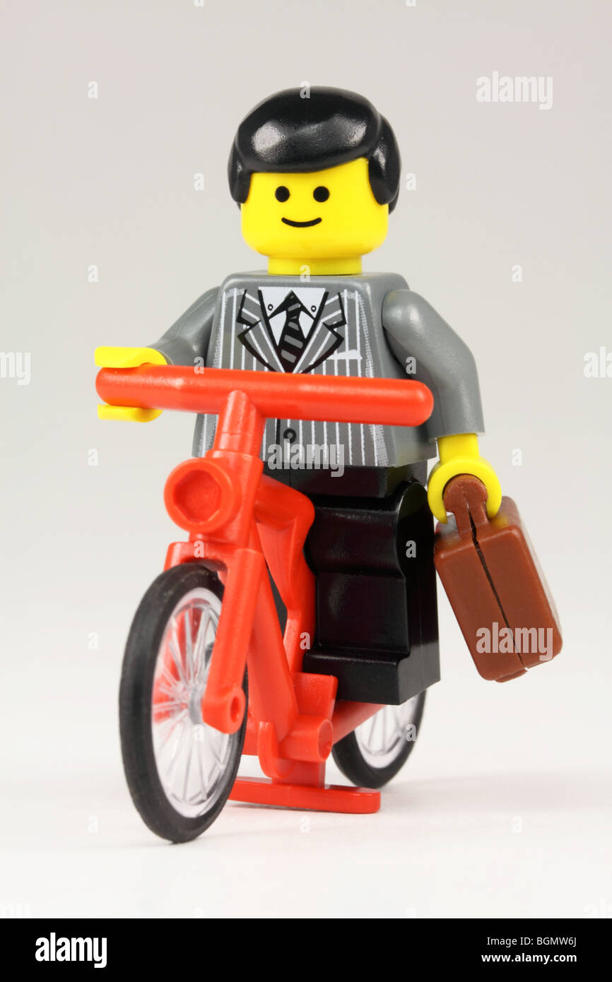 Businessman cycling to work Stock Photo