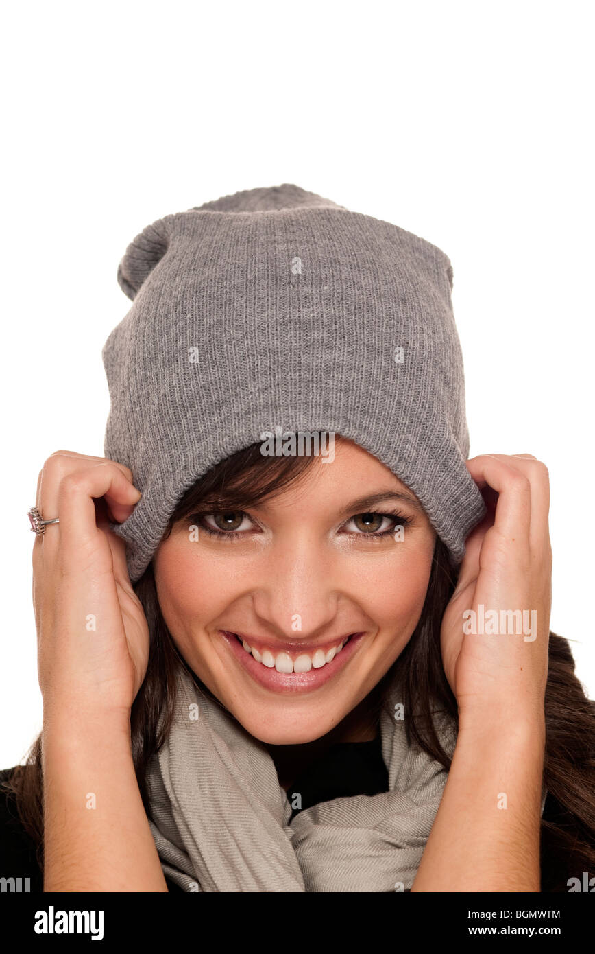 woman pulling her wooly hat down on her head Stock Photo Alamy