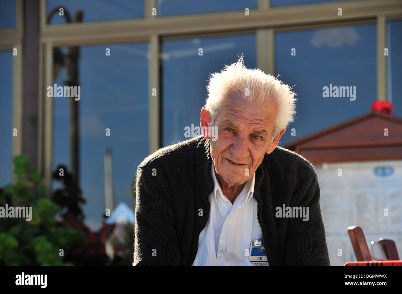 Old man white hair cardigan hi-res stock photography and images - Alamy