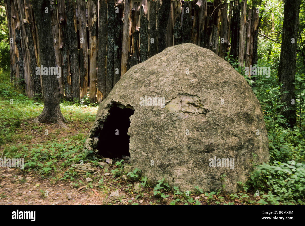 Small dome-shaped traditionally reconstructed Cherokee shelter of wattle and daub located in Tahlequah, OK. Stock Photo