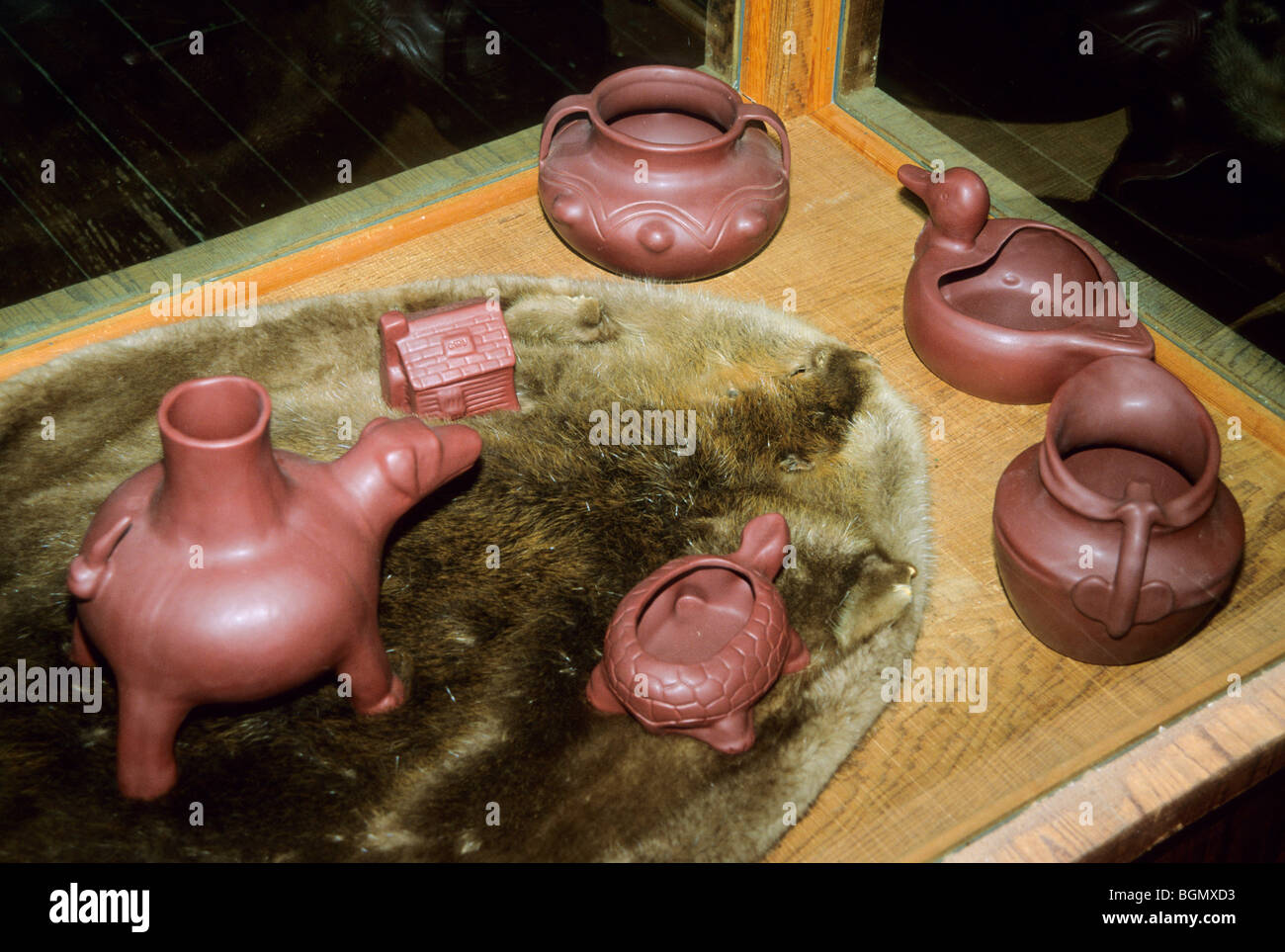 Variety of Cherokee clay pottery of animal shaped bowls and pots with