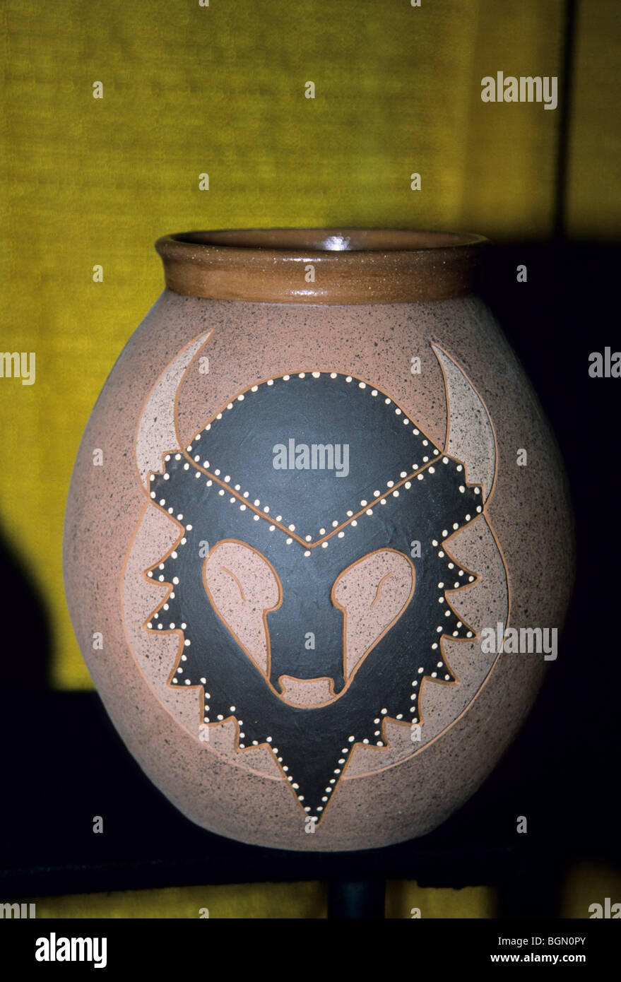 Clay pottery with eagle motif on exhibit during the arts and crafts show at the Red Earth Indian
