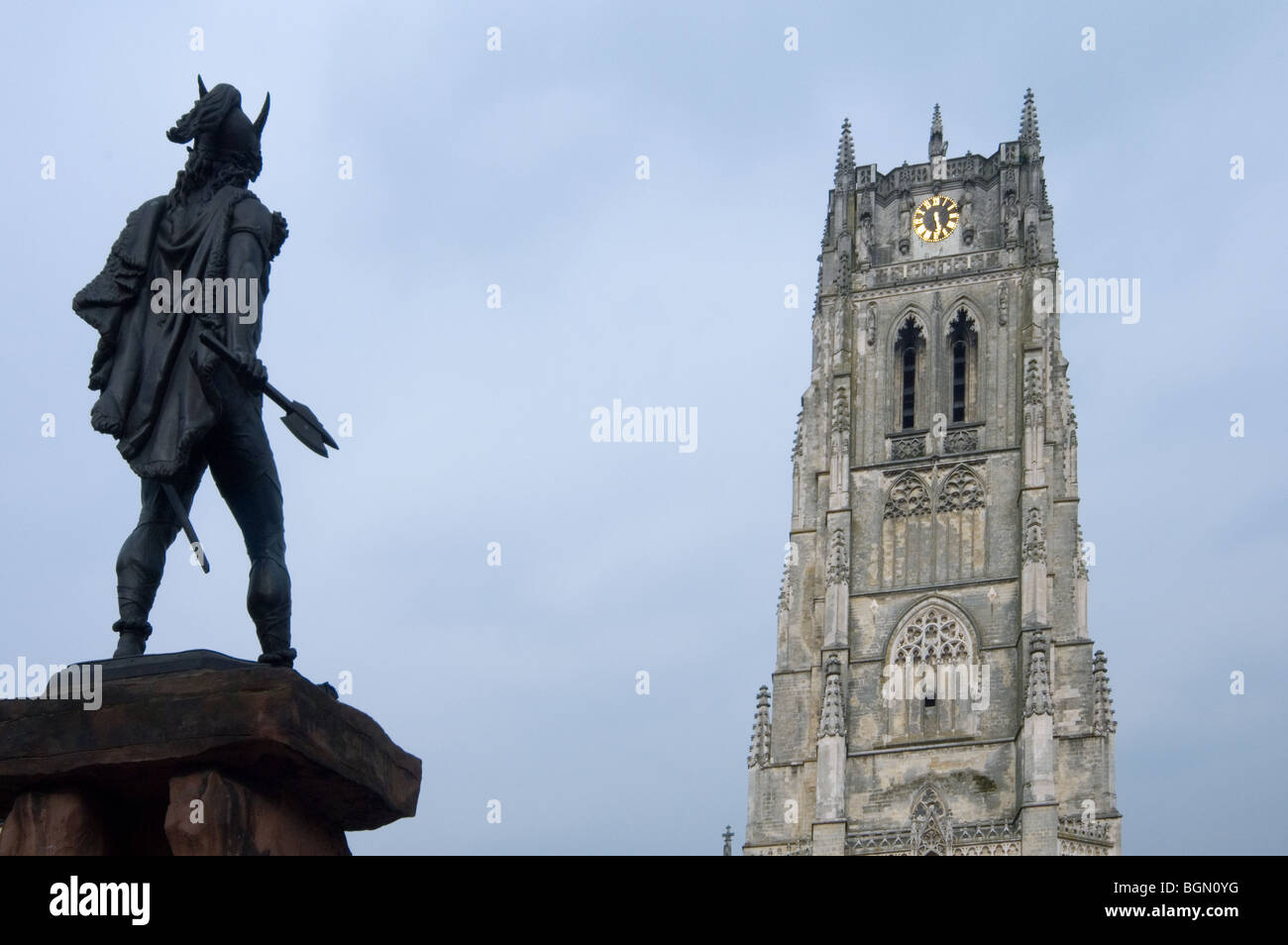 Basilica of Our Lady / Onze-Lieve-Vrouwebasiliek and the statue of Ambiorix, prince of the Eburones, Tongeren / Tongres, Belgium Stock Photo