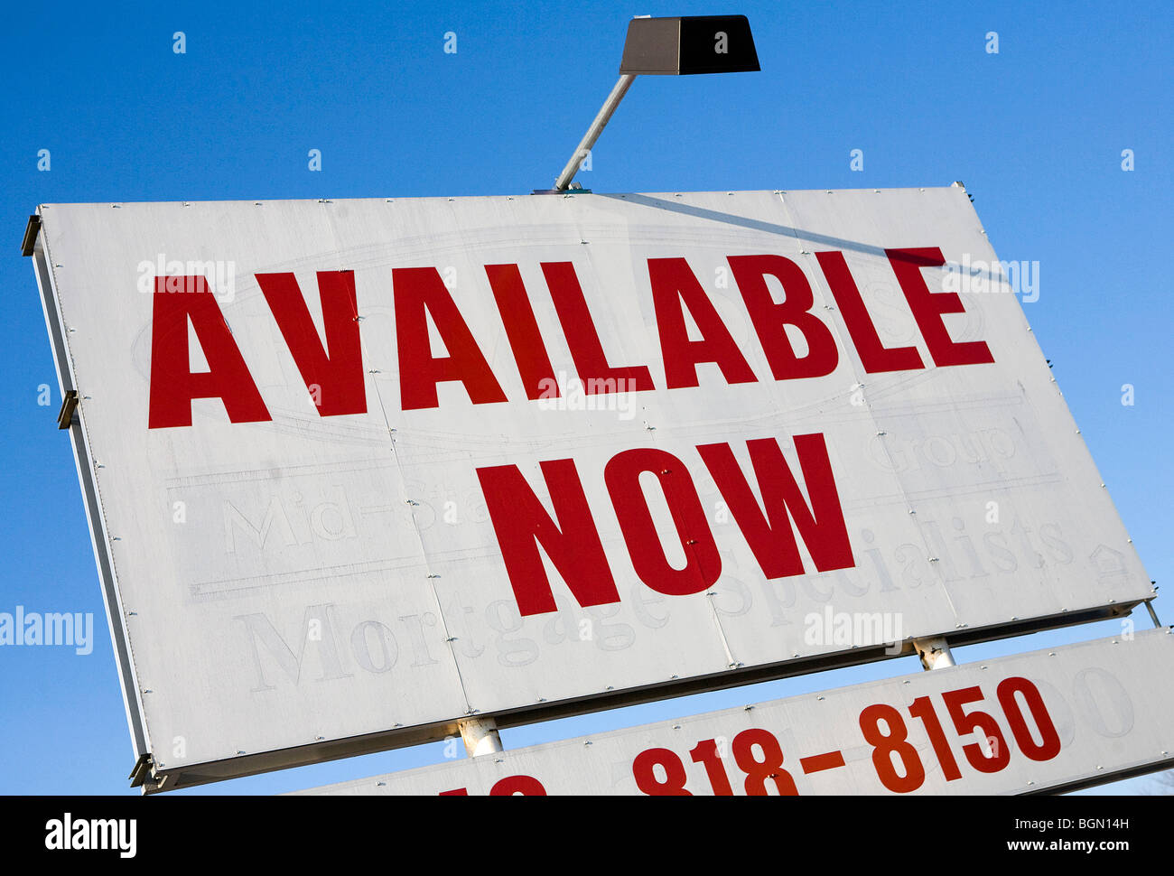 Signage advertising retail space for rent or lease.  Stock Photo