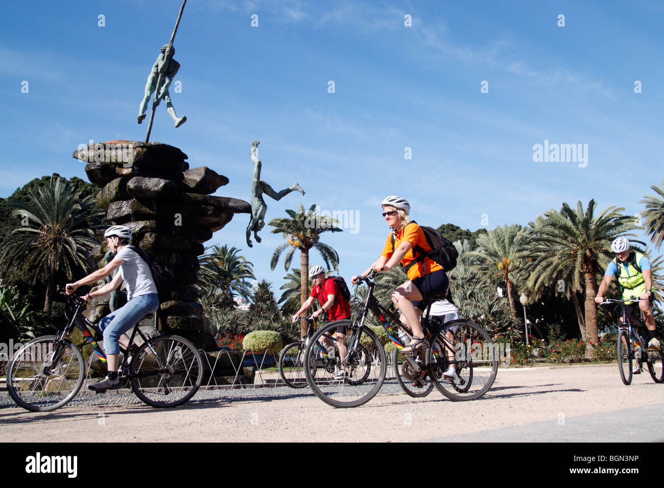 Tourists from cruise ship, 'Aida Luna', on guided city sightseeing tour on bikes in Las Palmas on Gran Canaria Stock Photo