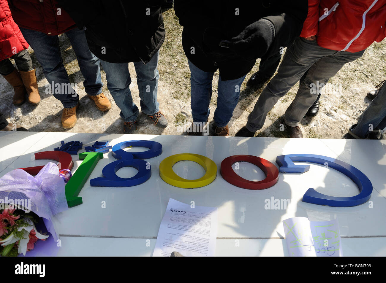 People look at the signboard of China's Google headquarters in Beijing China.14-Jan-2010 Stock Photo