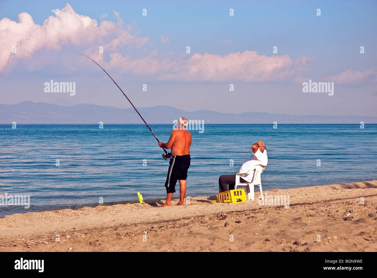 Locals fishing at Hanioti, Kassandra Peninsula, Halkidiki Greece. Stock Photo
