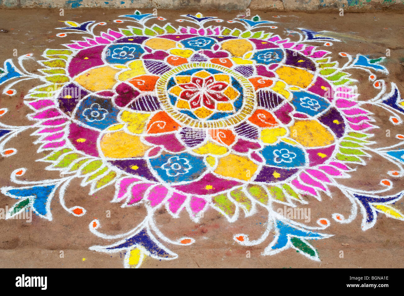 Rangoli designs in an Indian street , during the hindu festival of ...