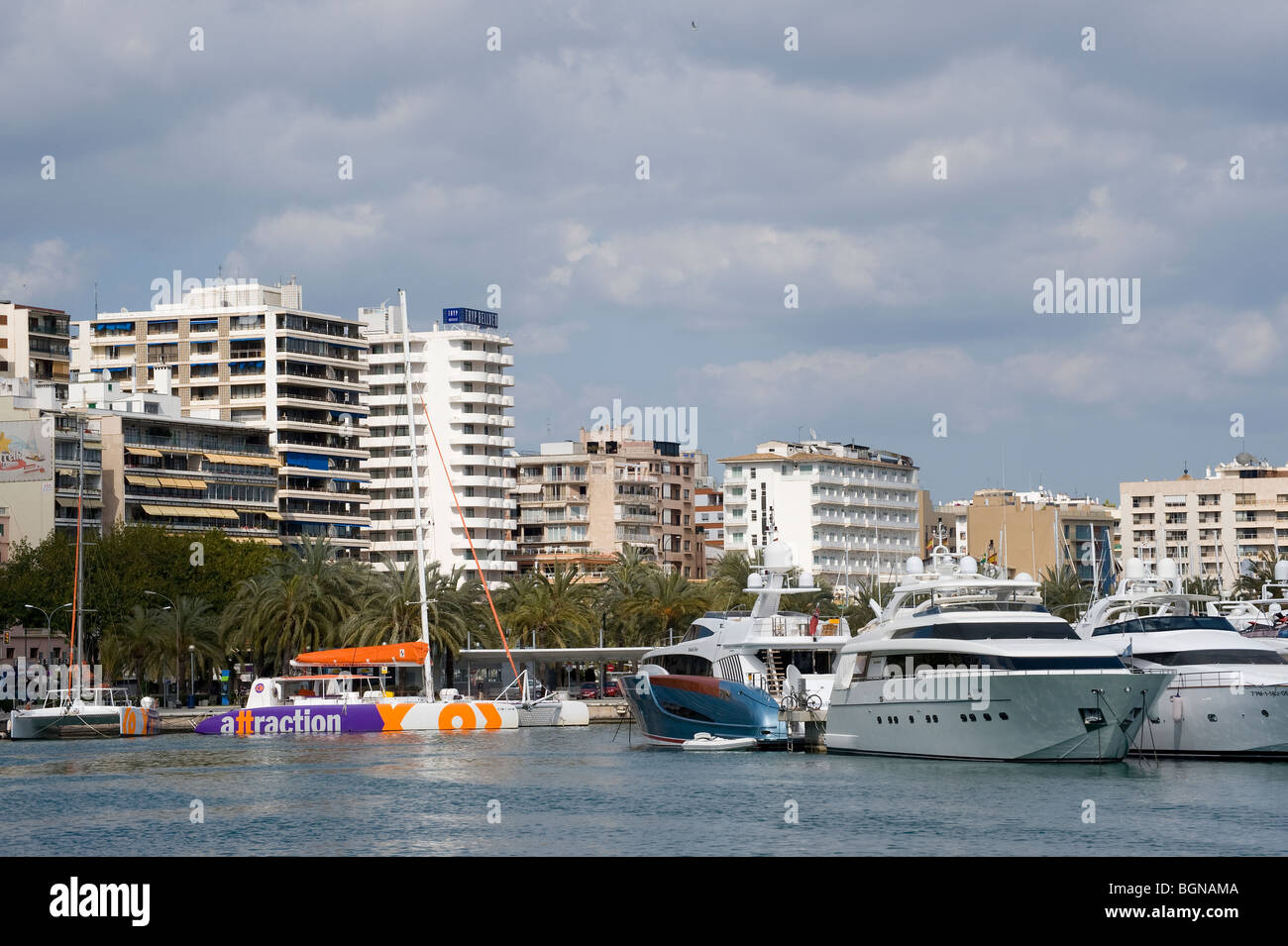 Boats moored in the harbour, with hotels in the background at Palma, Mallorca, Majorca, Spain Stock Photo