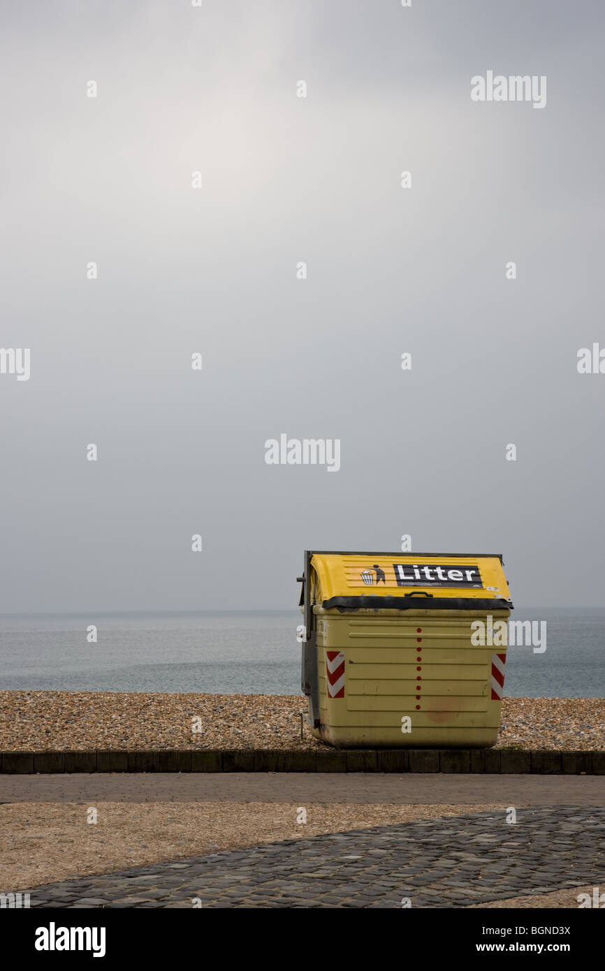 Litter bin garbage rubbish beach grey british beach Stock Photo