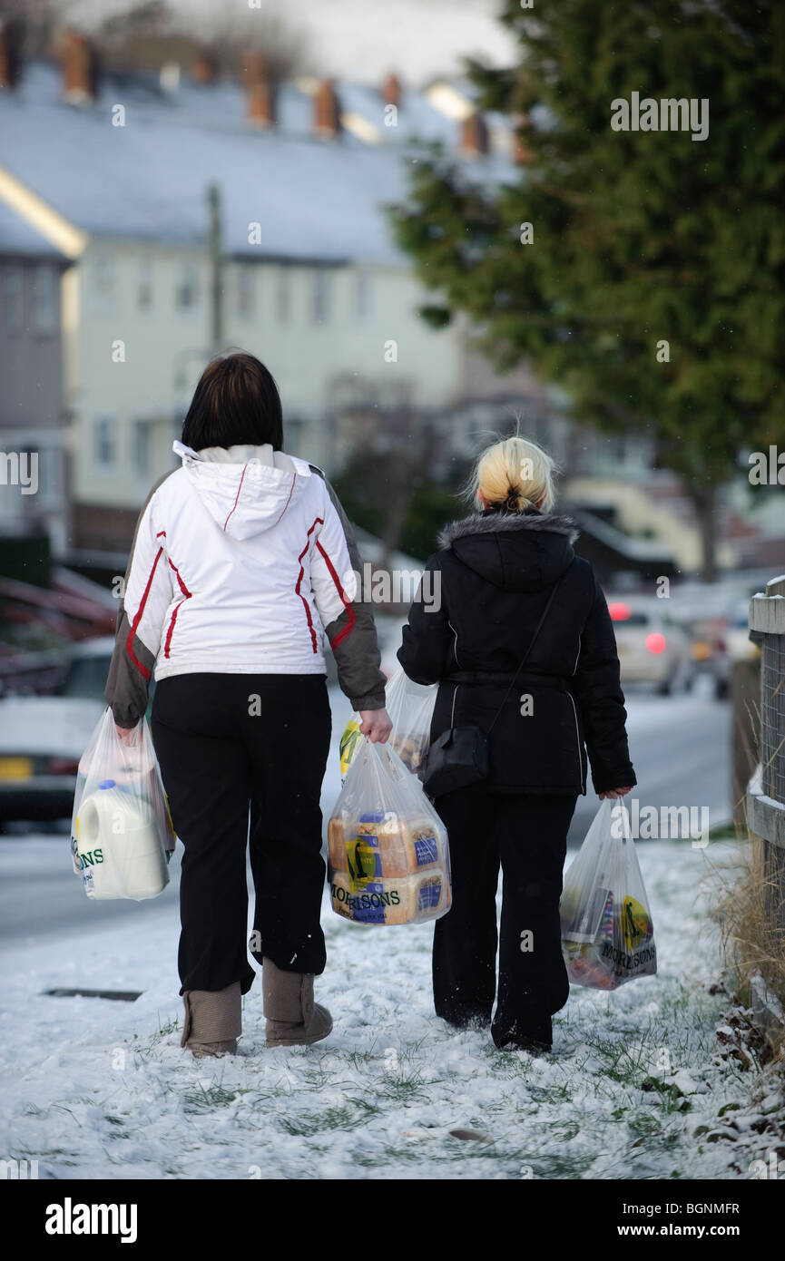 Woman carrying plastic bag hires stock photography and images Alamy