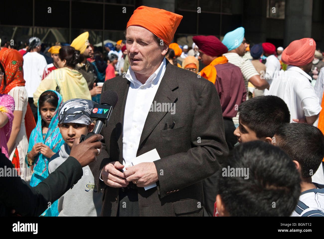 John Tory giving interview at the annual spring Vaisakhi parade in Toronto, celebrating the Sikh culture Stock Photo