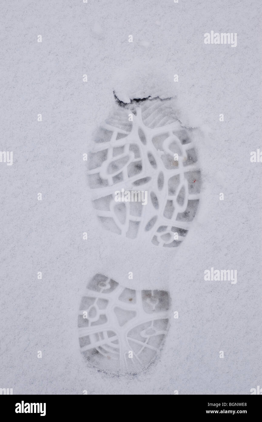 Footprint in the snow Stock Photo