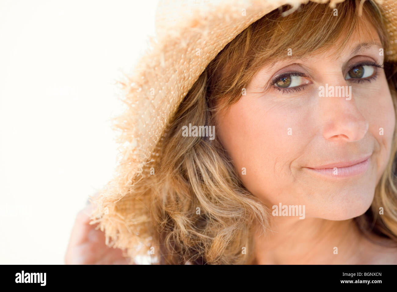 Portrait of a mature woman smirking Stock Photo