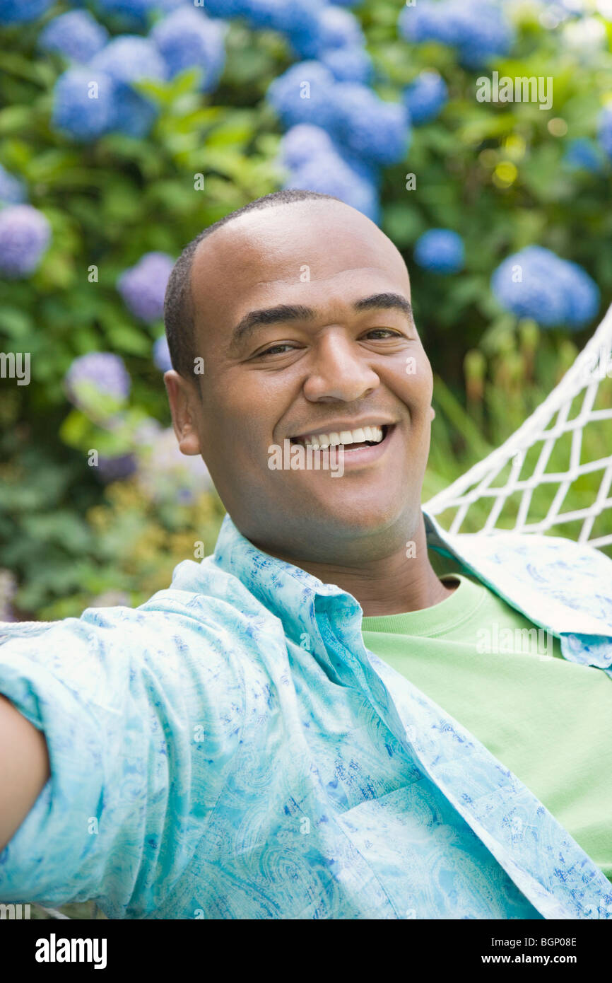 Mid adult man lying in hi-res stock photography and images - Alamy