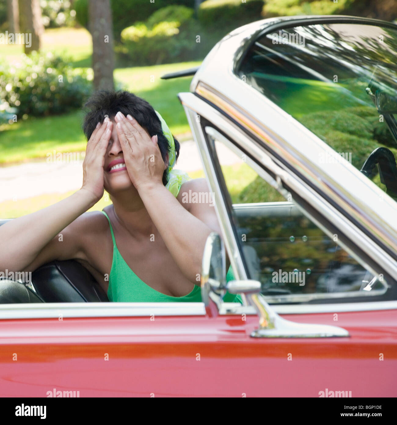 Close-up of a mature woman covering her face with her hands Stock Photo ...