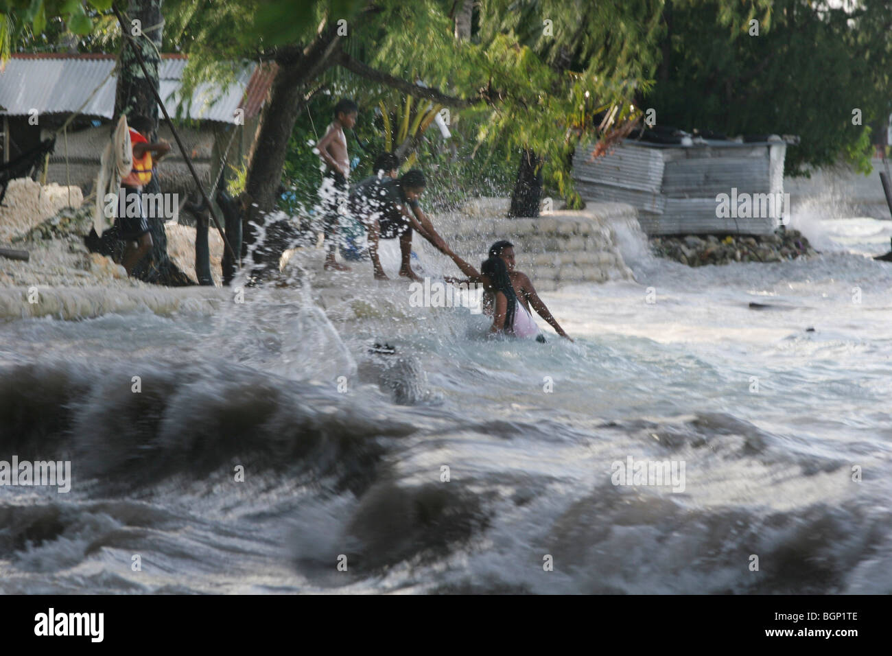 King Tides waves on the beach, on the island of Kiribati Stock Photo