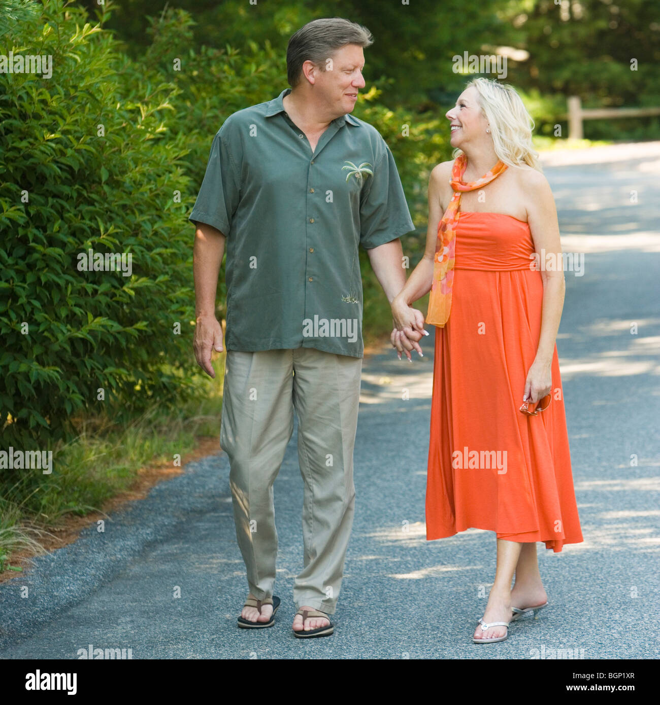 Couple holding each other hands hi-res stock photography and images - Alamy
