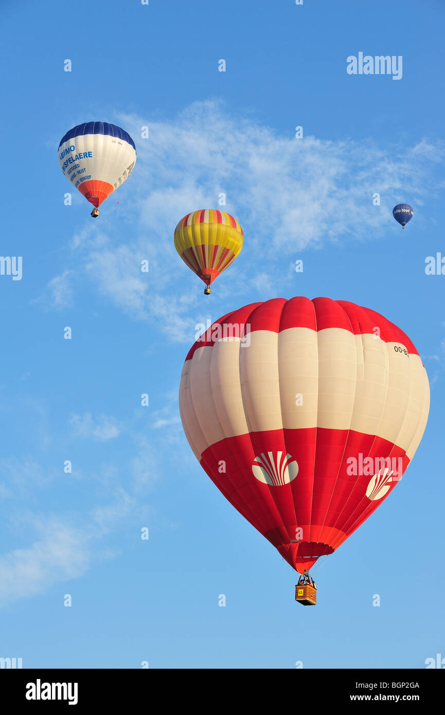 Balloonists / Aeronauts flying in hot-air balloons during ballooning meeting Stock Photo