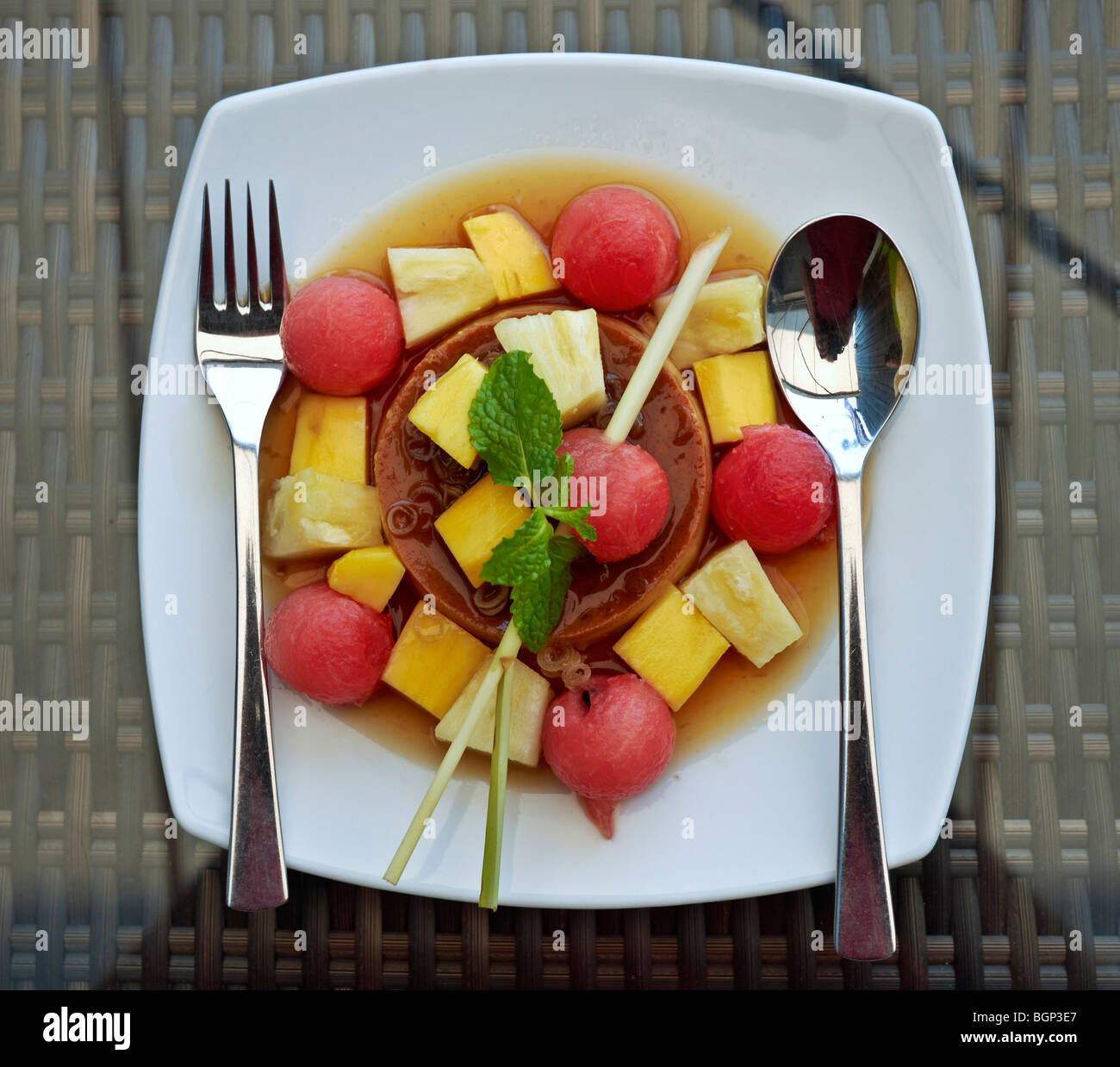 Mixed fruit dessert and Creme caramel Stock Photo Alamy
