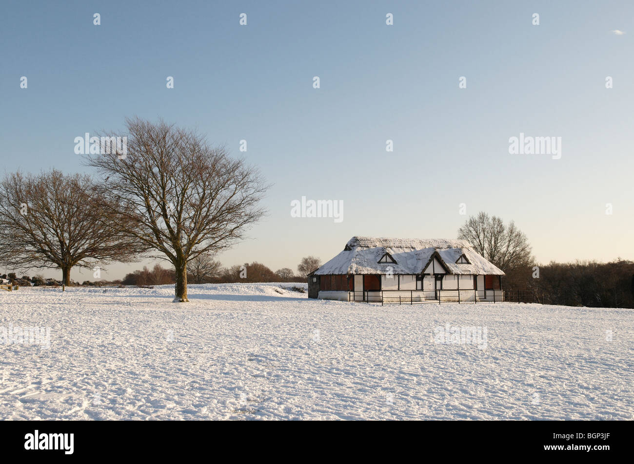 The snow covered cricket pavillion at Bolton's Bench at Lyndhurst in the New Forest National Park, Hampshire, England. Stock Photo