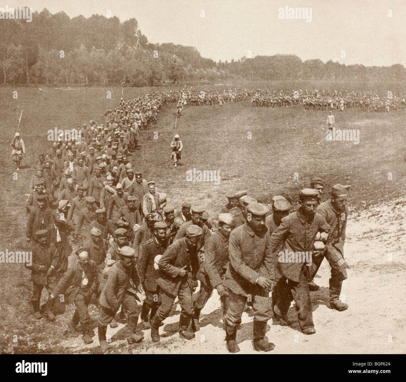 German soldiers captured on the Western Front are marched to the rear to prisoner of war camps. Stock Photo