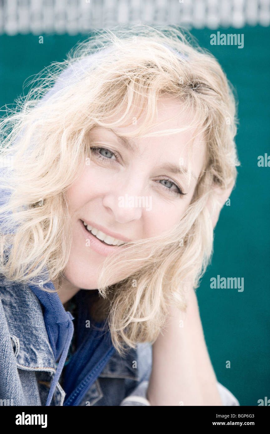 Portrait of a mature woman smiling Stock Photo - Alamy