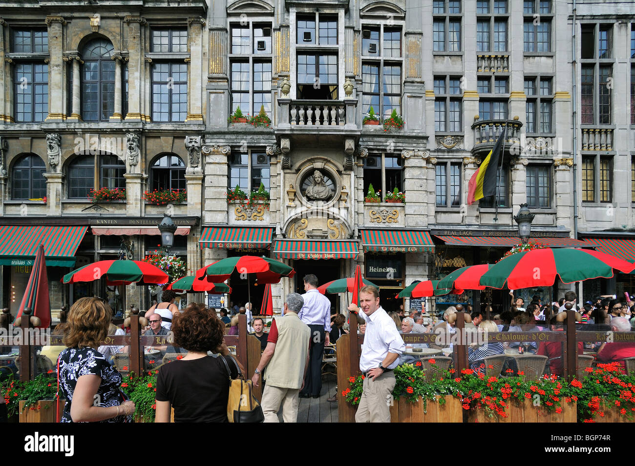 Tourists at restaurant De Gulden Boot, at the Market square / Grand Place / Grote Markt, Brussels, Belgium Stock Photo