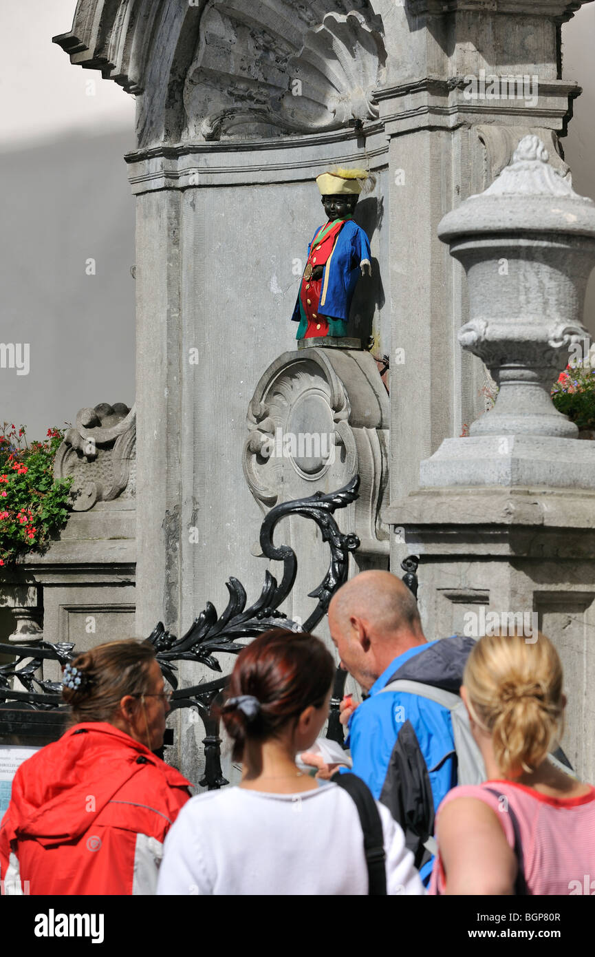 Fountain statue Little Man Pee / Petit Julien / Manneken Pis dressed in one of his 700 traditional costumes, Brussels, Belgium Stock Photo