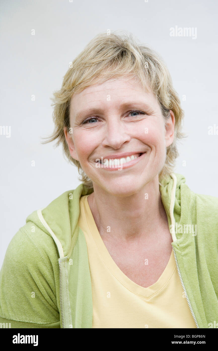 Portrait of a mature woman smiling Stock Photo - Alamy