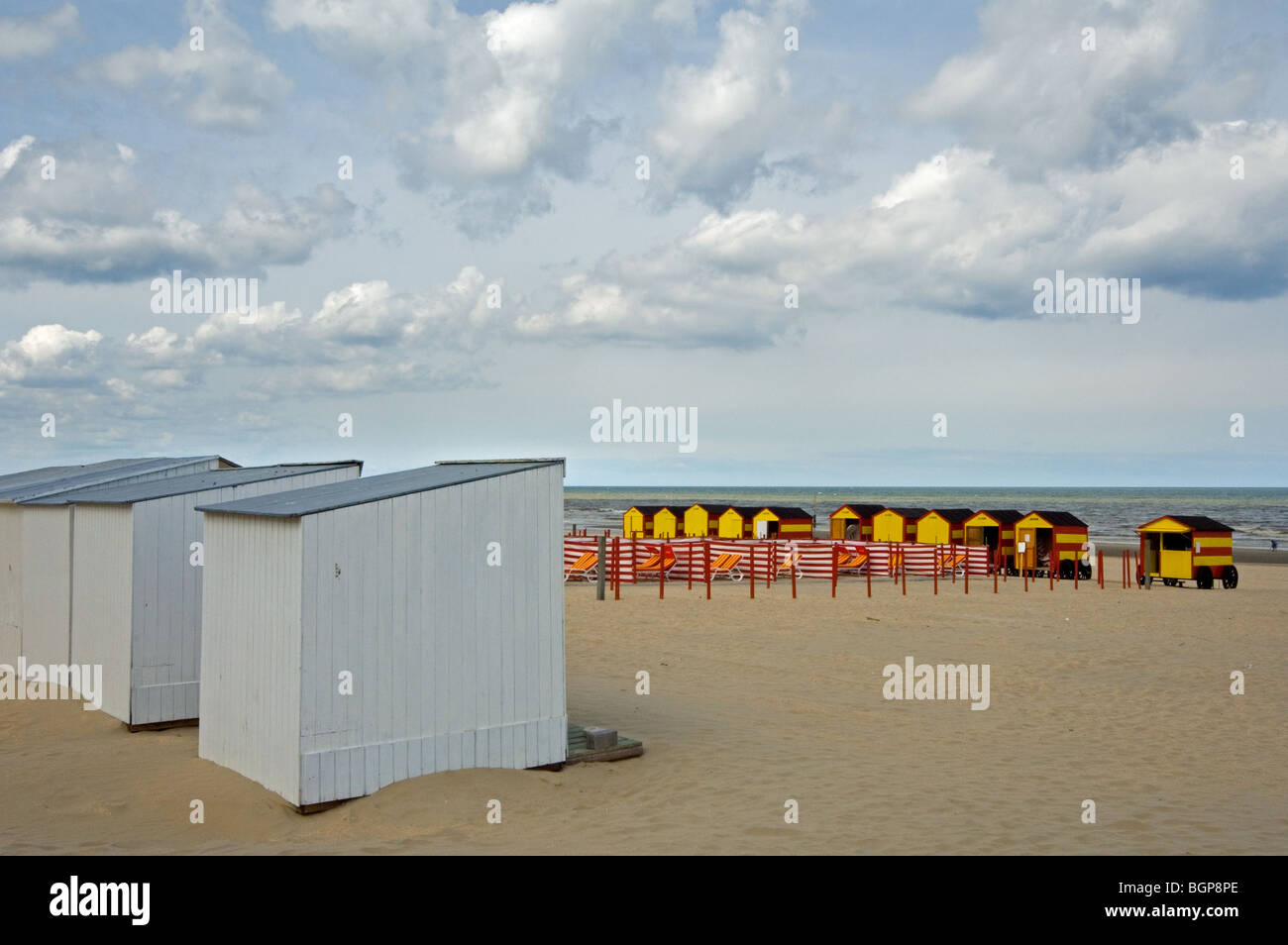 Row Of Colourful Beach Cabins On Wheels Along The North Sea Coast
