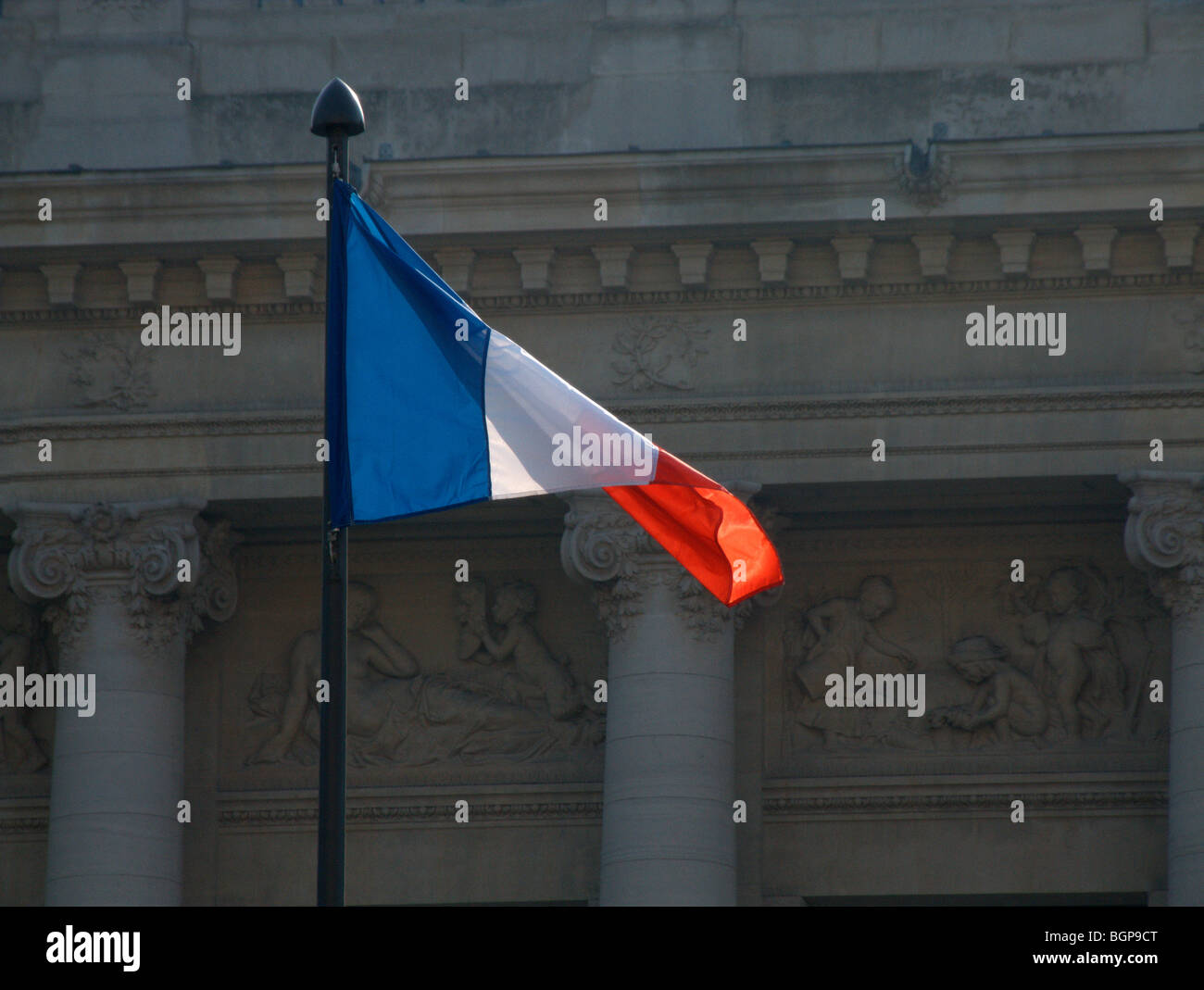 French flag. Grand Palais (built for the Paris Exhibition of 1900). Paris. France Stock Photo